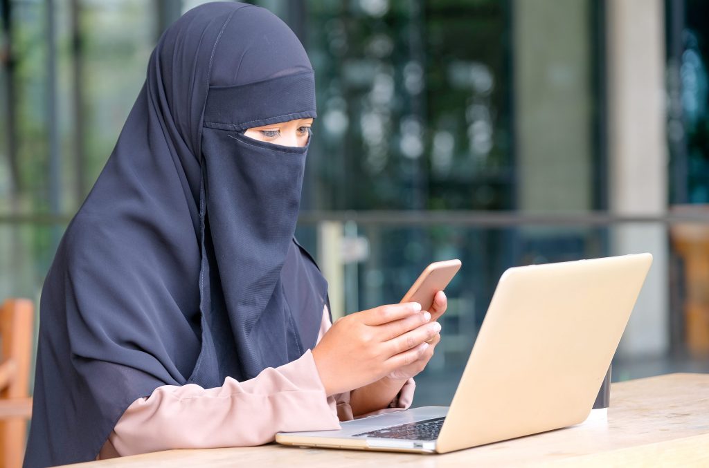 Muslim girl with hidden face hijab